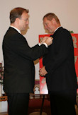 Bryan Dawson presents AHF pin to the Honorable Kevin Stricklin, MSHA Administrator
