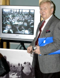 AHF's Imre Toth with his mini-documentary on the 1956 Hungarian Revolution [© Bryan Dawson-Szilagyi, AHF News Service]