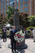 AHF International Relations Committee member Paul Kamenar with AHF's wreath at the Victims of Communism Memorial in Washington, DC