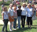 Erika Fedor, Chair of the AHF Social Committee and Zsuzsa Dreisziger, President of the Hungarian American Club (Amerikai Magyar Klub) pose with Zalaber students
