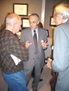 Edward Hilbert talking with guests at teh "Freedom Dance" reception