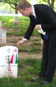 Bryan Dawson-Szilagyi places the AHF commemorative ribbon on the Gravesite of S/Sgt. Lászlo Rábel, Vietnam War hero and Congressional Medal of Honor Winner
